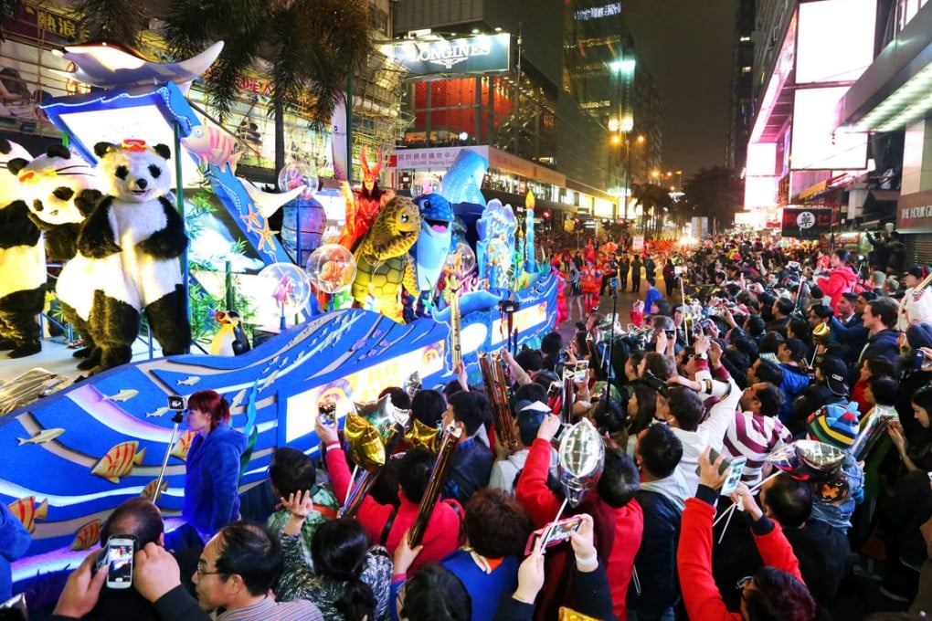 Crowds flock to watch the entertainment on Canton Road. Photo: SCMP Pictures