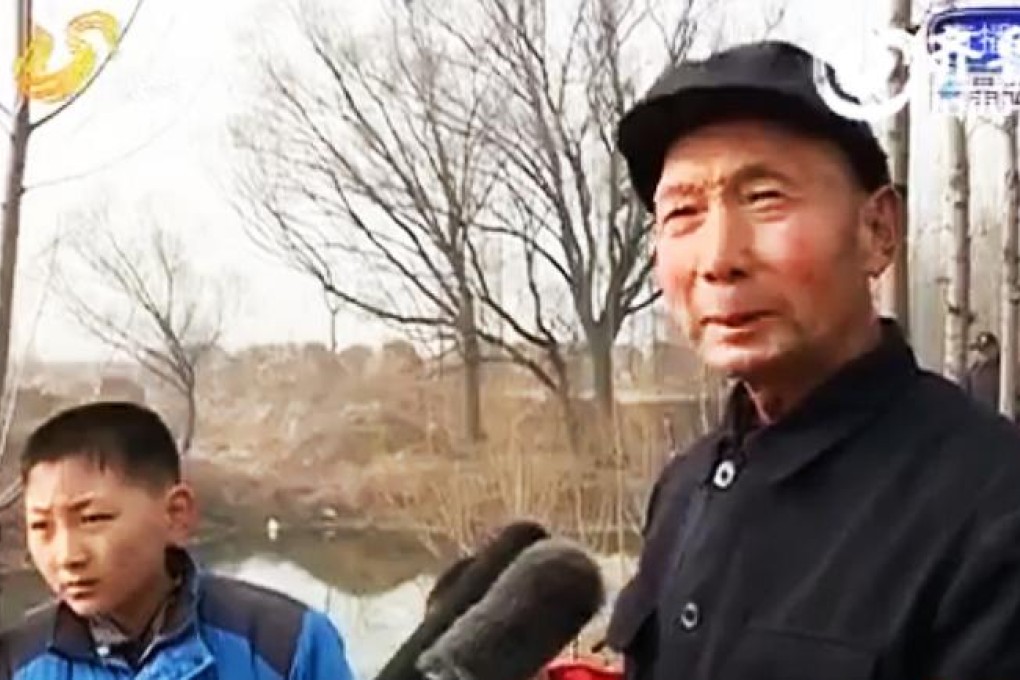 Septuagenarian Zhuang Xuejie is the local hero in Dezhou, Shandong after he saved three children who fell through broken ice on a local river. Photo: SCMP Pictures