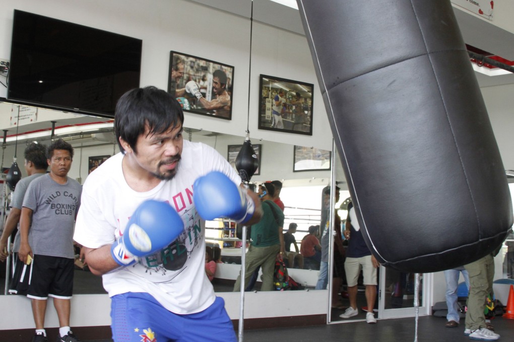 Manny Pacquiao works out on Saturday at a gym in General Santos City, Mindanao. The fight with Floyd Mayweather will finally answer the question as to which of the two is the best pound-for-pound fighter of their generation. Photo: AFP