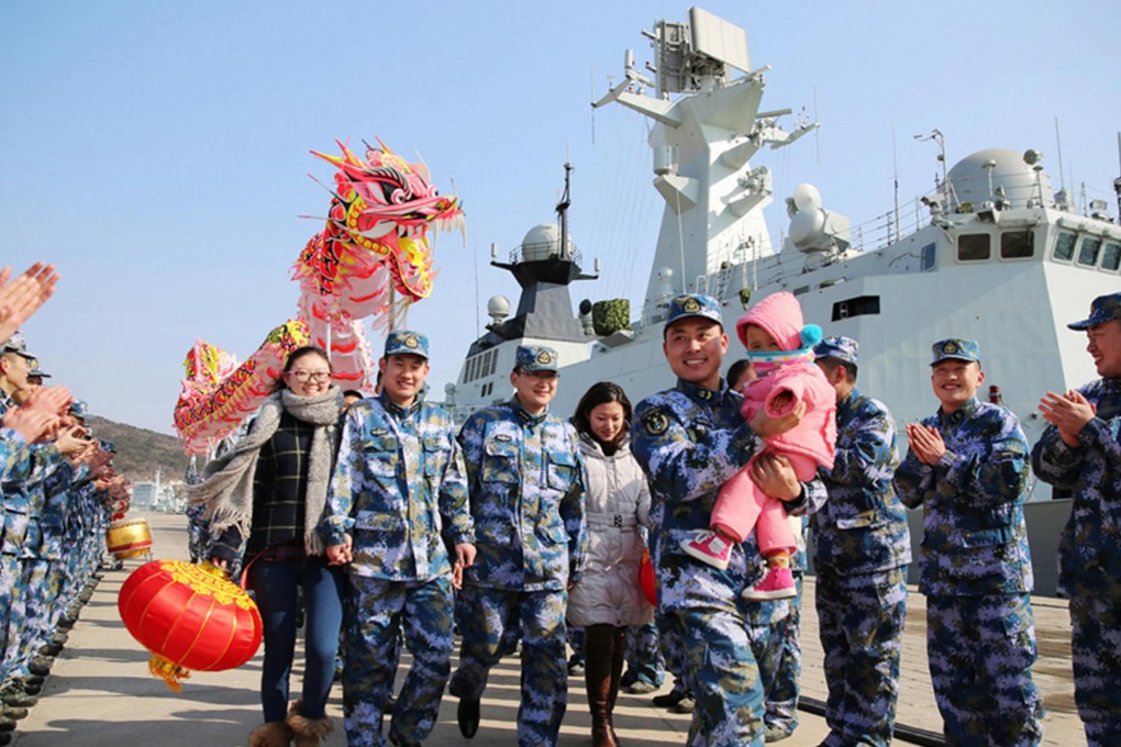 Wives and children of PLA non-commissioned officers enjoy a happy family reunion in a military camp to celebrate the Year of the Goat. Photo: PLA Daily