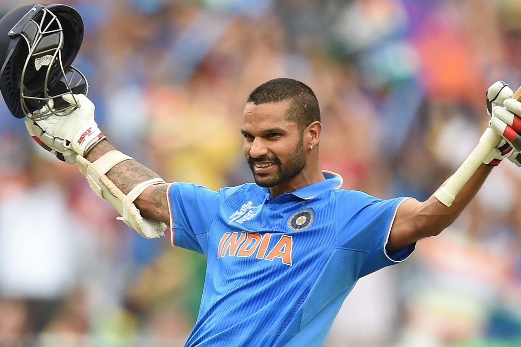 India's Shikhar Dhawan celebrates his century against South Africa in their World Cup match at the Melbourne Cricket Ground. Dhawan smashed a career-best 137 in India's crushing win. Photo: EPA