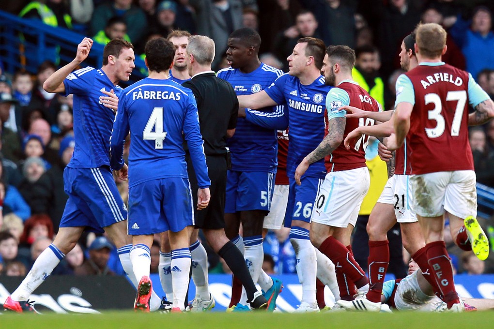 Nemanja Matic was sent off for reacting to a violent tackle from Ashley Barnes. Photo: AFP