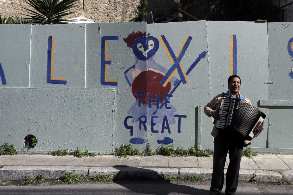 Graffiti celebrating Greece's Alexis Tsipras. Photo: AP