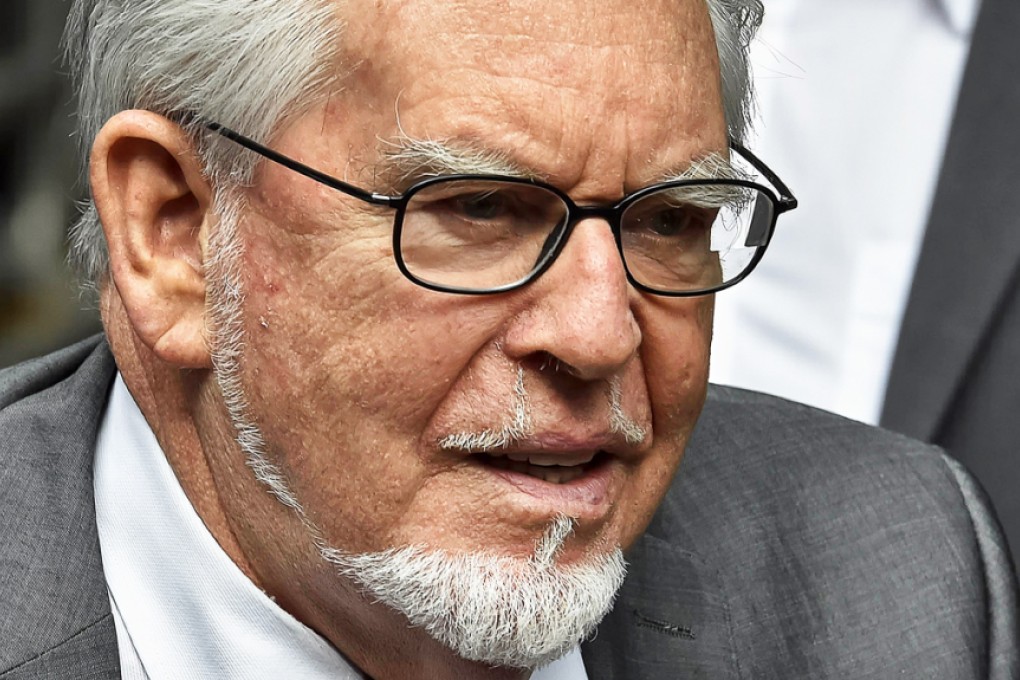 Veteran entertainer Rolf Harris arrives at Southwark Crown Court in central London in this July 4, 2014 file photo. Photo: AFP