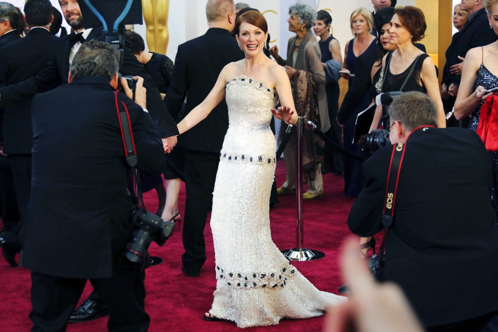 "Karl Lagerfeld made this for me," said best actress nominee Julianne Moore of her custom beaded white strapless Chanel gown with black accents. Photo: Reuters