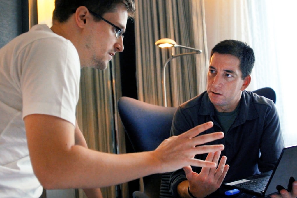 Edward Snowden (left) appears with Glenn Greenwald in a scene from Citizenfour. Photo: AP