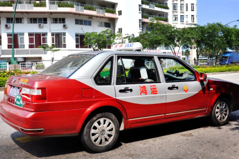 A taxi on the streets of Shenzhen. The city's government is reviewing the fees drivers pay to cab companies, according to a newspaper report. Photo: SCMP Pictures