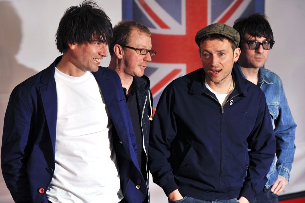Graham Coxon, right, pictured with band mates bassist Alex James, left, drummer Dave Rowntree and singer Damon Albarn, said Hong Kong has made its way into Blur's music. Photo: AFP