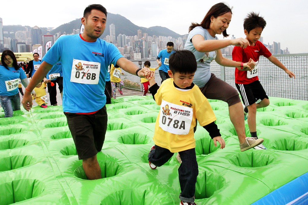 Parents will benefit from extra child allowances. Photo: Edward Wong