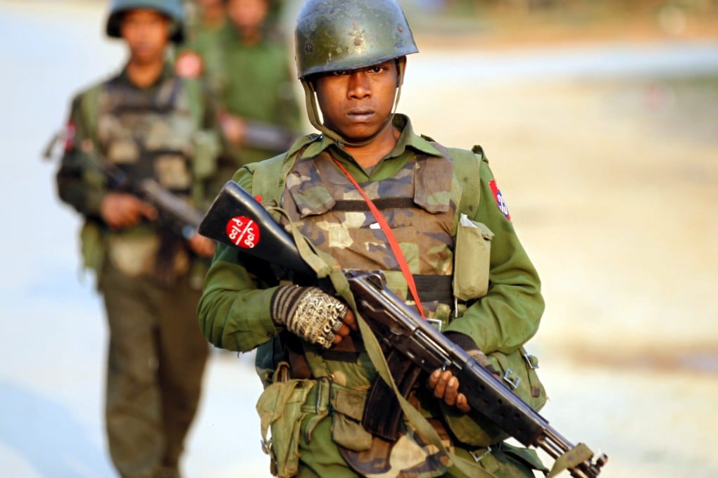 Troops on patrol in the Kokang region of Myanmar. Government forces are fighting ethnic-Chinese rebels. Photo: EPA