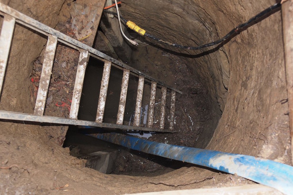 This image provided on Tuesday by the Toronto Police i shows a ladder going down into the mysterious tunnel found near York University. Photo: AFP