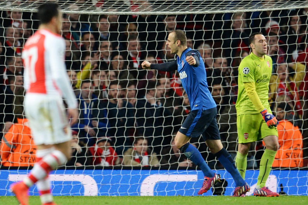 Monaco's Dimitar Berbatov celebrates his goal against Arsenal. Photo: EPA