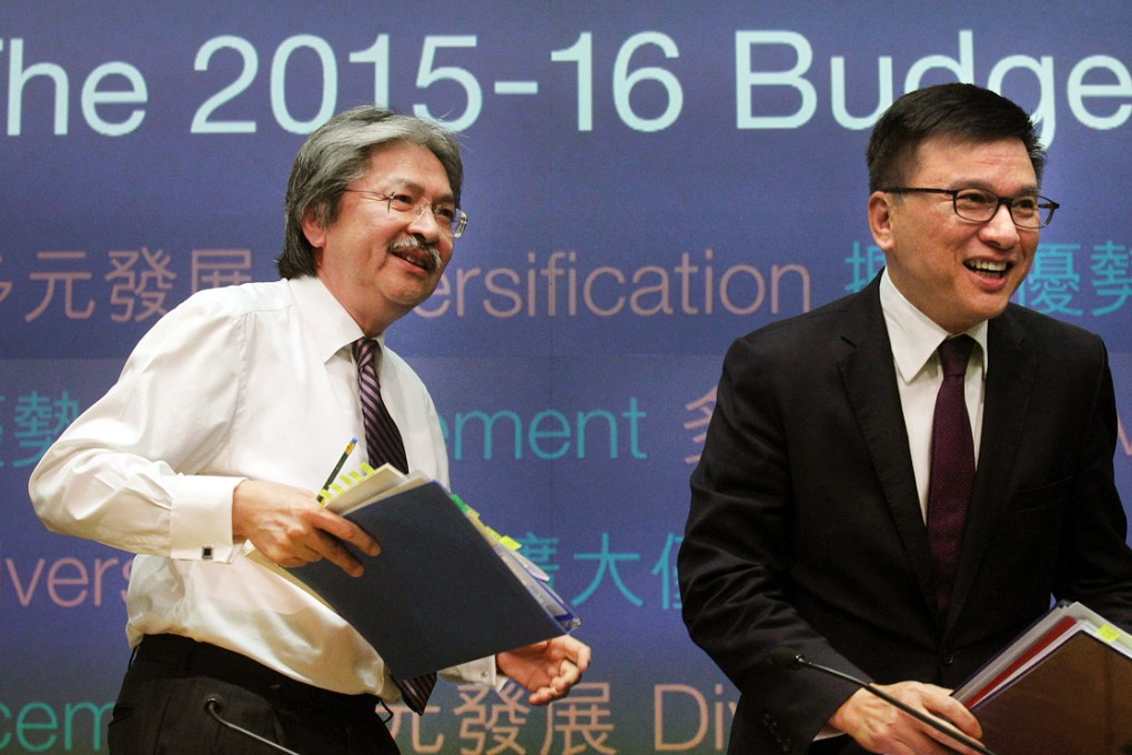 John Tsang (left) and Secretary for Financial Services and the Treasury Chan Ka-keung meet the press. Photo: Dickson Lee