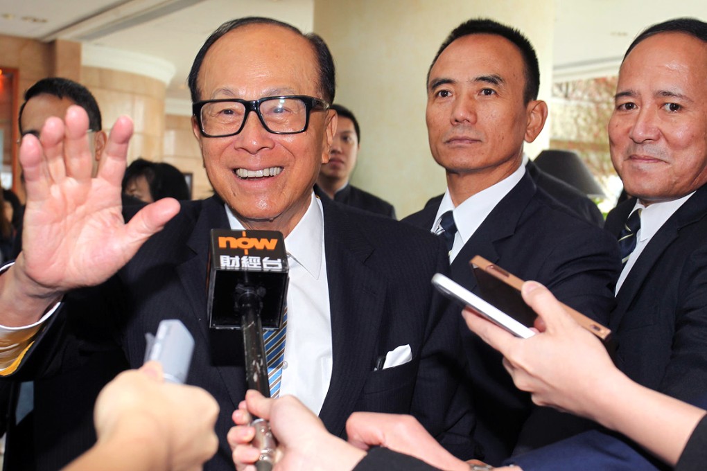 Li Ka-shing says planned reorganisation, described as the group's biggest since 1997, is aimed at unlocking value in Cheung Kong and Hutchison Whampoa.Photo: Dickson Lee