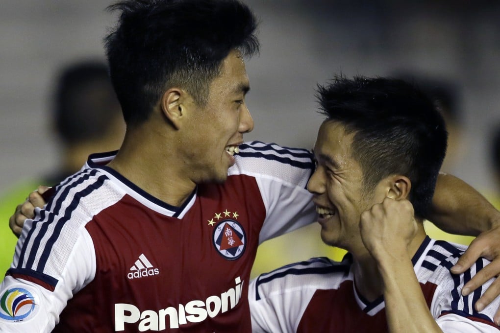 South China's Lo Kong-wai' (left) celebrates his goal with Philip Chan Siu-kwan in their AFC Cup group match against Global in Manila. Photos: AP