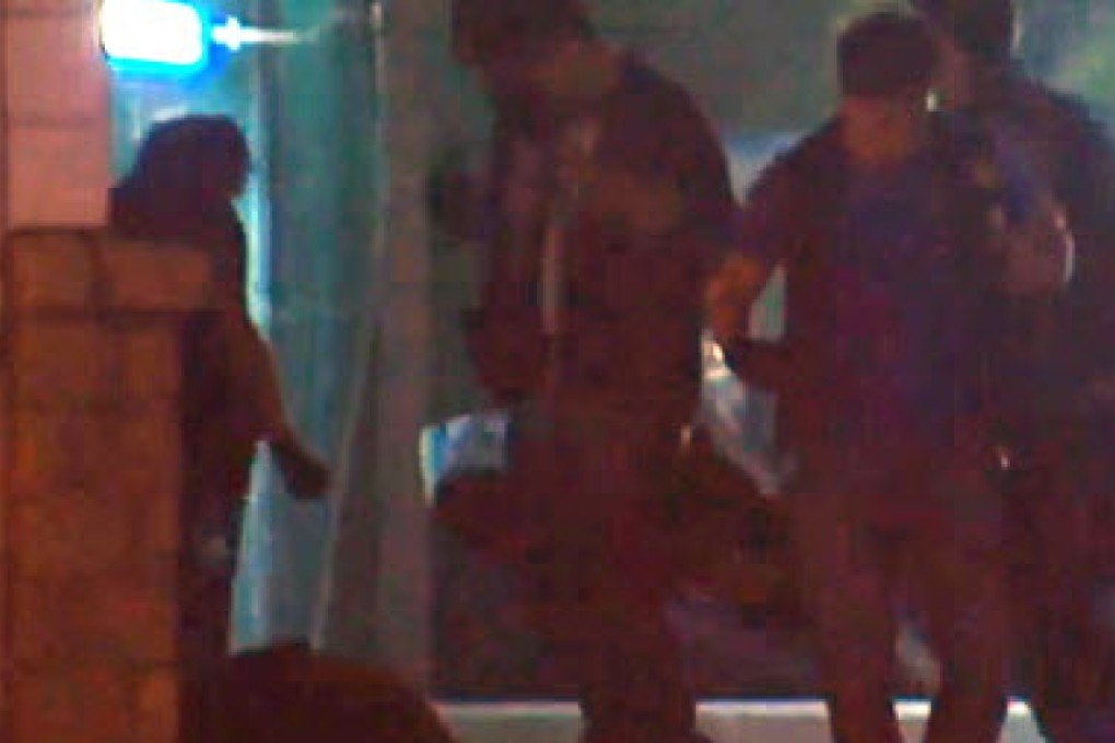 TVB footage showed police apparently punching and kicking Civic Party member Ken Tsang. Photo: SCMP