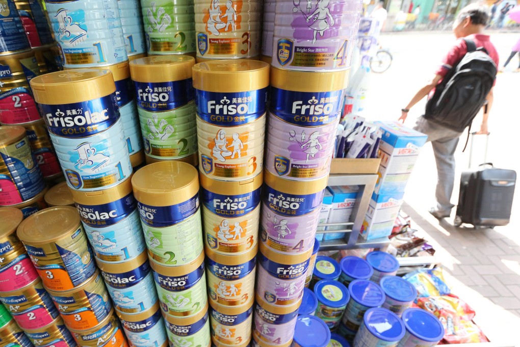 Visitors buy infant formula in bulk. Photo: Felix Wong