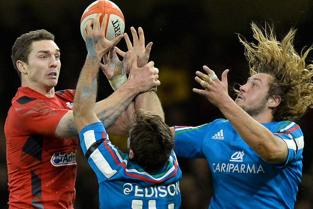 George North in action against Italy. The Welsh winger will pass a significant milestone on Saturday when he makes his 50th international appearance. Photos: AFP