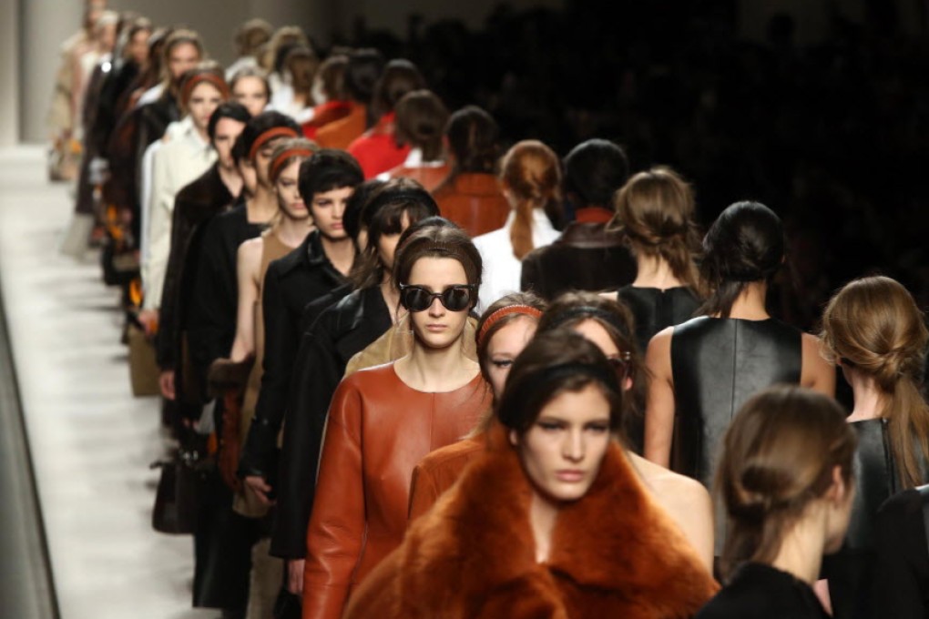 Fendi models on the catwalk for the brand's Milan autumn-winter 2015 show. Photo: EPA