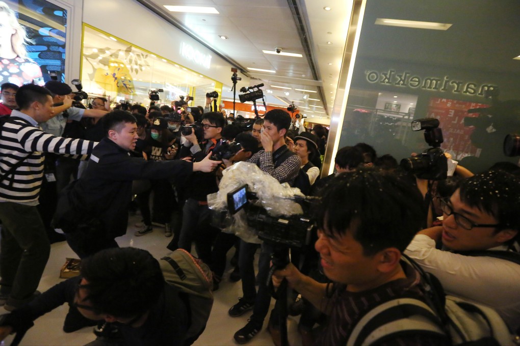 Protesters clash with police officers during a rally against parallel trading at New Town Plaza in Sha Tin earlier this month. Photo: Felix Wong