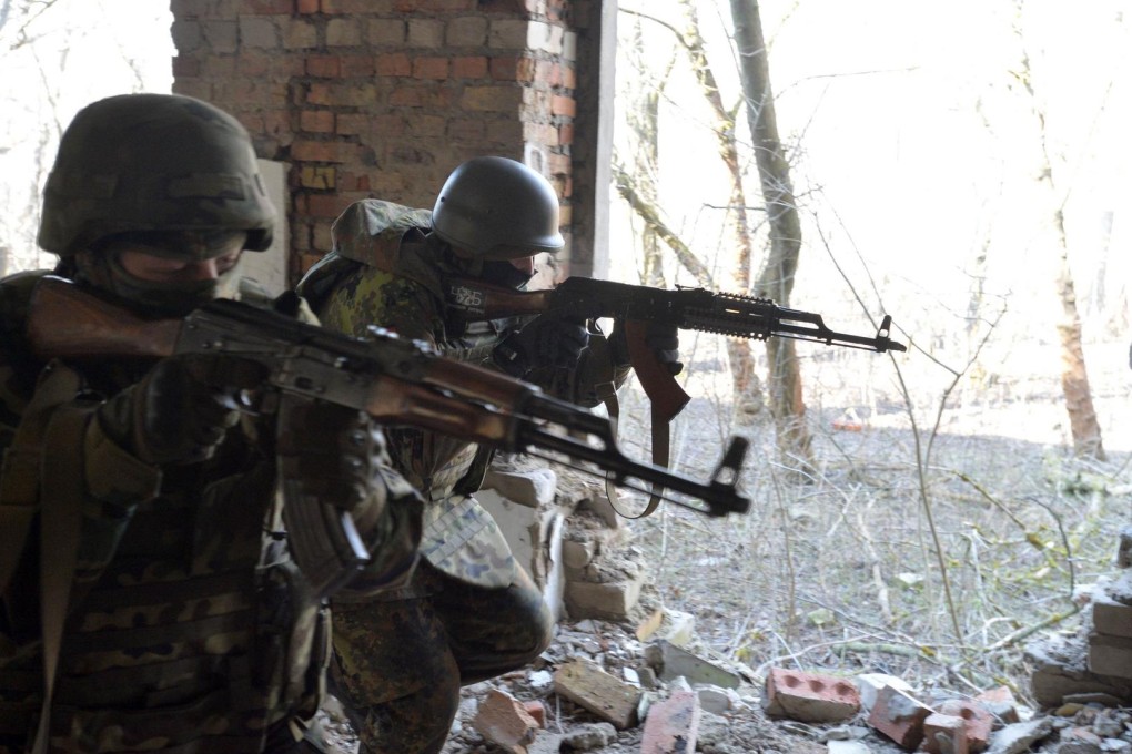 Fighters with a Ukrainian volunteer battalion participate in exercises in the southeast. Photo: AFP