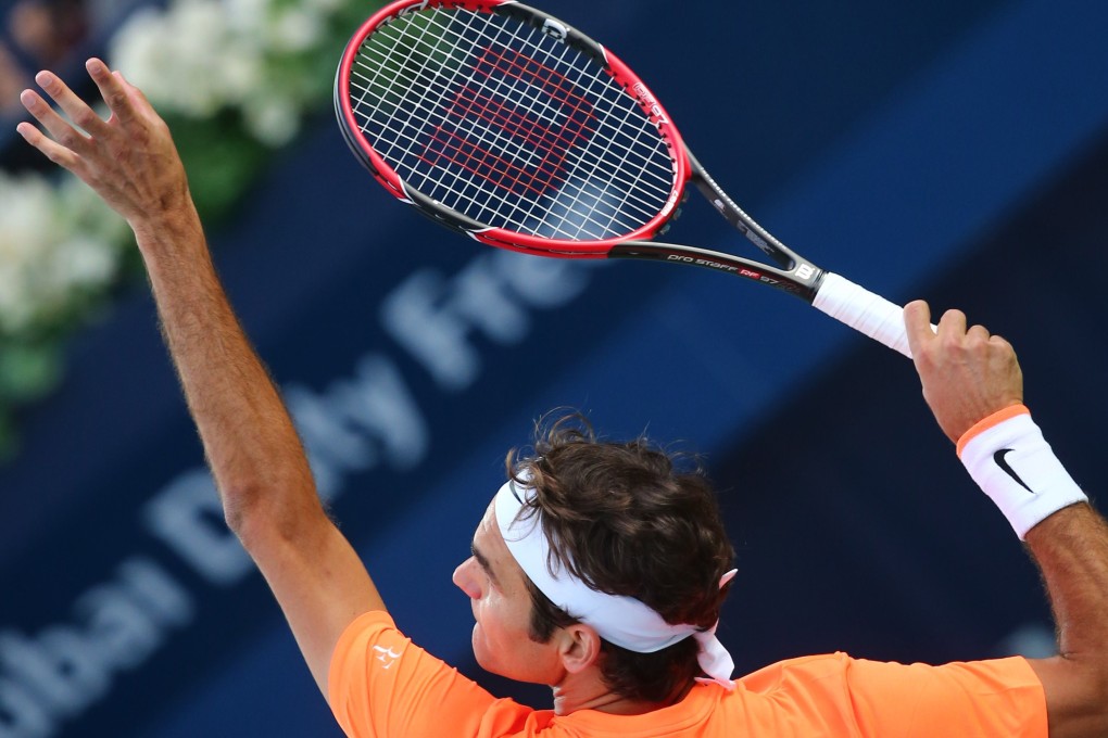 Roger Federer of Switzerland serves the ball to Borna Coric of Croatia. Federer won the match 6-2, 6-1. Photos: AFP