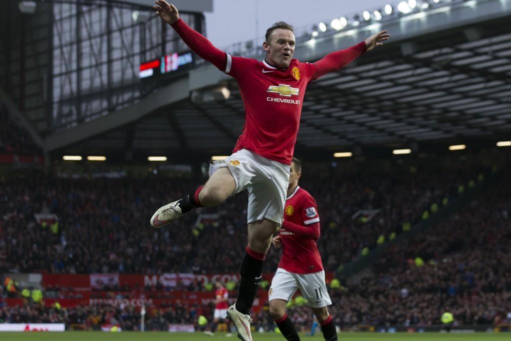Manchester United's Wayne Rooney jumps for joy after scoring his second goal in the 2-0 win over Sunderland in their English Premier League match at Old Trafford. Photo: AP