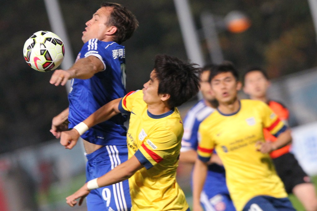 Eastern's Dylan Macallister (left) and Kitchee's Kim Tae-min in action during their Premier League match at Tseung Kwan O Sports Ground. Photos: Dickson Lee