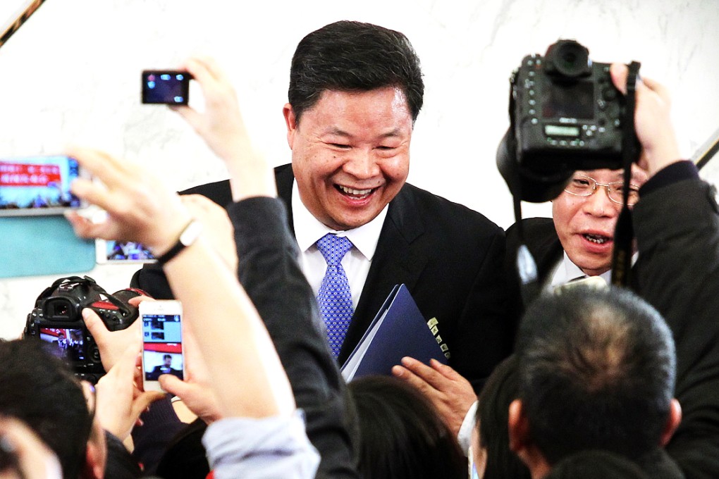 Chinese People’s Political Consultative Conference spokesman Lu  Xinhua speaks to the media at a press conference on Monday afternoon. Photo:  Simon Song