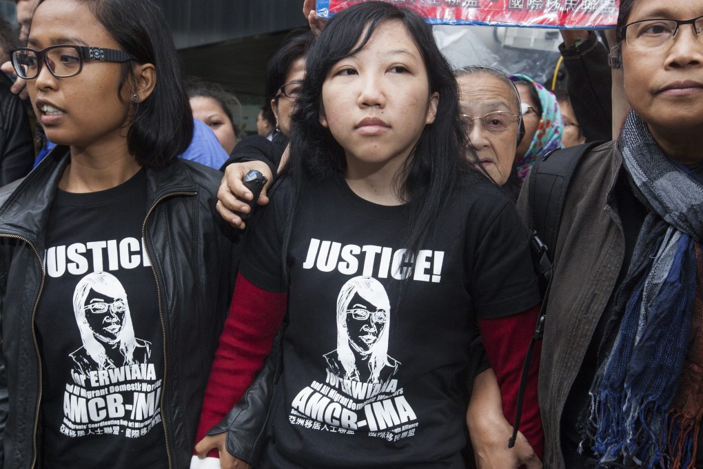 It is heartbreaking to read the story of Erwiana Sulistyaningsih (centre in photo) and then that of Anis Andriyani (not pictured). Photo: EPA