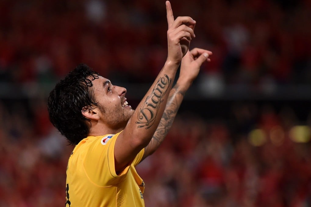 Ricardo Goulart celebrates scoring one of his three goals in Guangzhou Evergrande's 3-2 win over Western Sydney Wanderers in the AFC Champions League. Photos: EPA