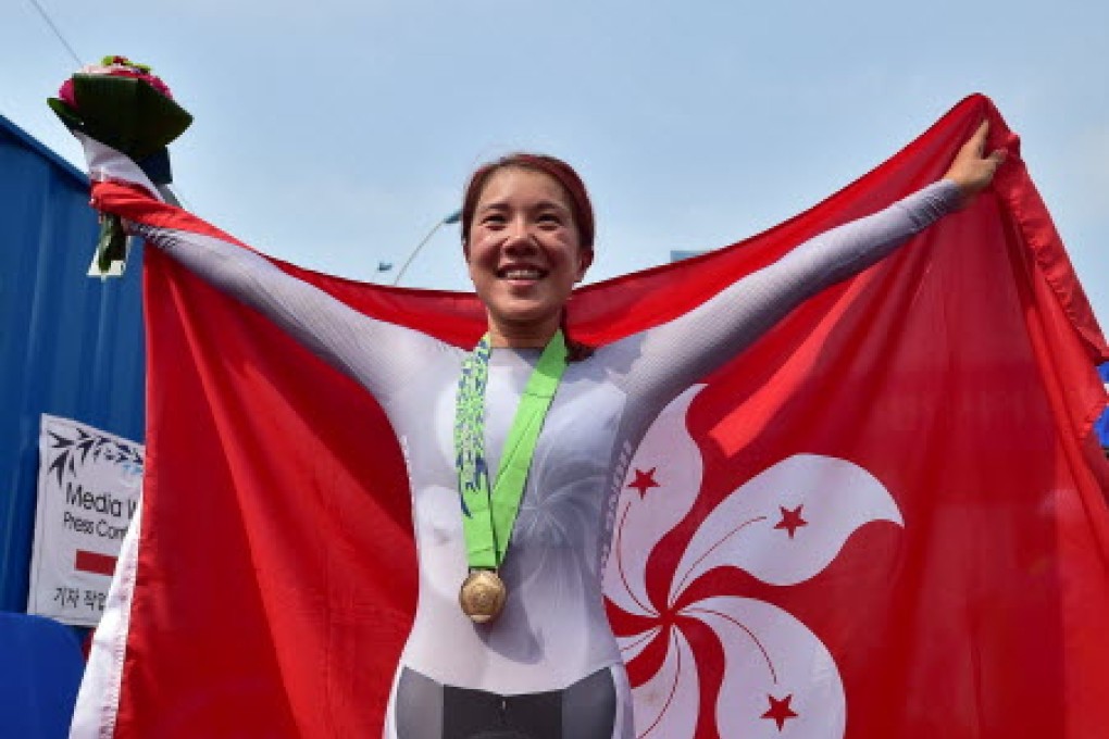 Hong Kong cyclist Jamie Wong celebrates her bronze medal inthe individual time trial of the 2014 Asian Games in Incheon. Photo: AFP