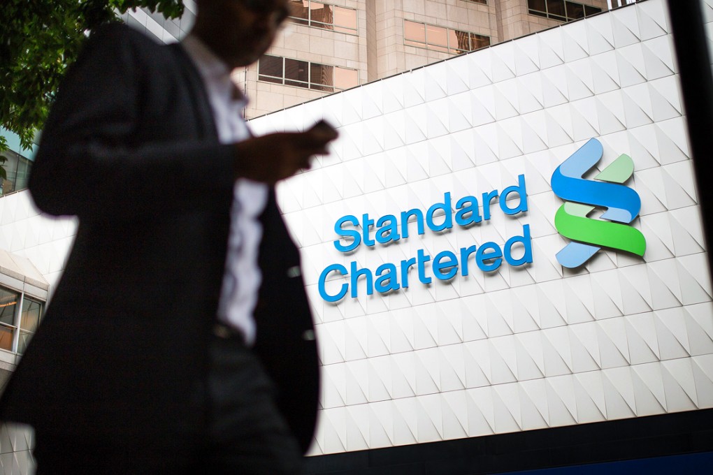 Standard Chartered is looking to save US$1.8 billion through aggressive cuts in businesses and headcount in three years. Photo: Bloomberg