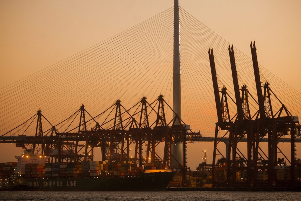 Ships berthed at the Kwai Chung port. Here in Hong Kong, the shipping industry voluntarily initiated the Fair Winds Charter in 2011. Photo: EPA