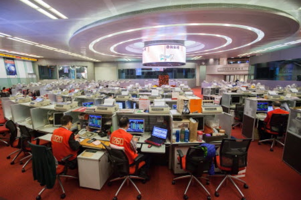 The exchange's daily average turnover for all of last year was HK$69.46 billion. Photo: EPA