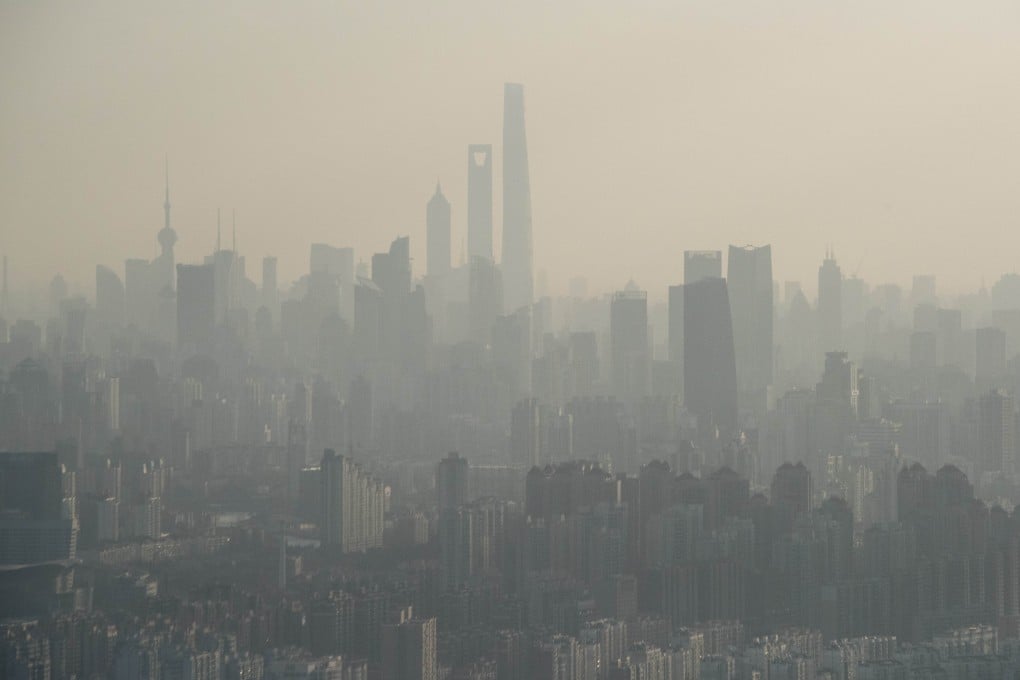 Shanghai's skyline shrouded in smog last month. China's economic planning body wants to halt any increased use of coal, one the main causes of pollution. Photo: AFP