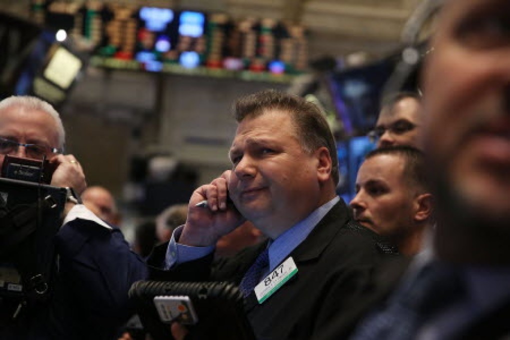 The benchmark S&P 500 index closed at a record high on Monday. Photo: AFP