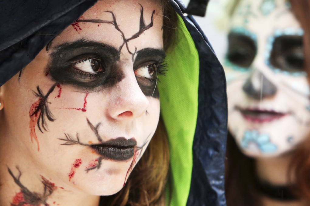 Revellers take part in a Zombie Walk carnival parade during carnival festivities in Curitiba on February 15, 2015. Photo: Reuters