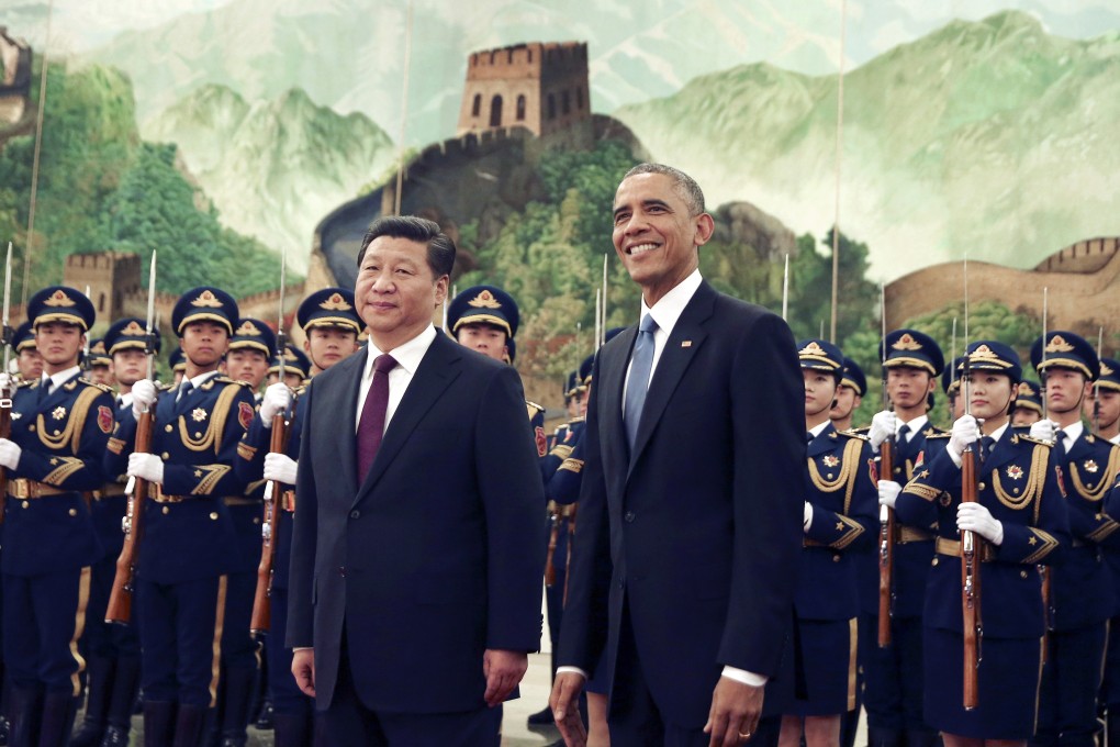 US President Barack Obama smiles as a group of children wave flags and flowers during a welcome ceremony held by Chinese President Xi Jinping at the Great Hall of the People in Beijing. Photo: AP