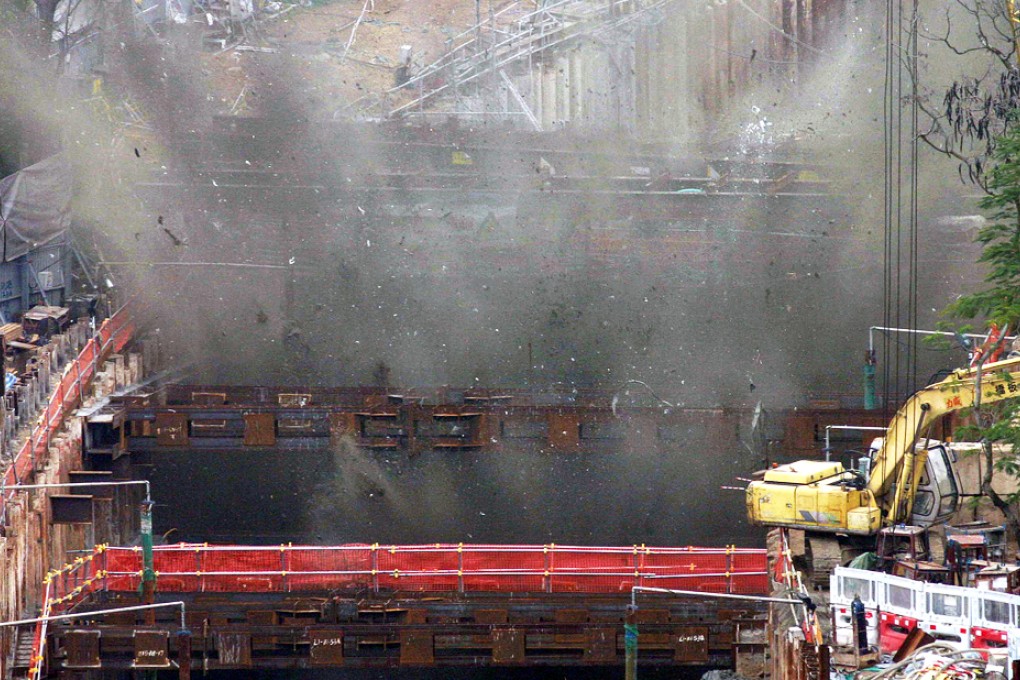 The detonation took three days as bomb disposal officers struggled with slippery conditions on the construction site. Photo: SCMP Pictures