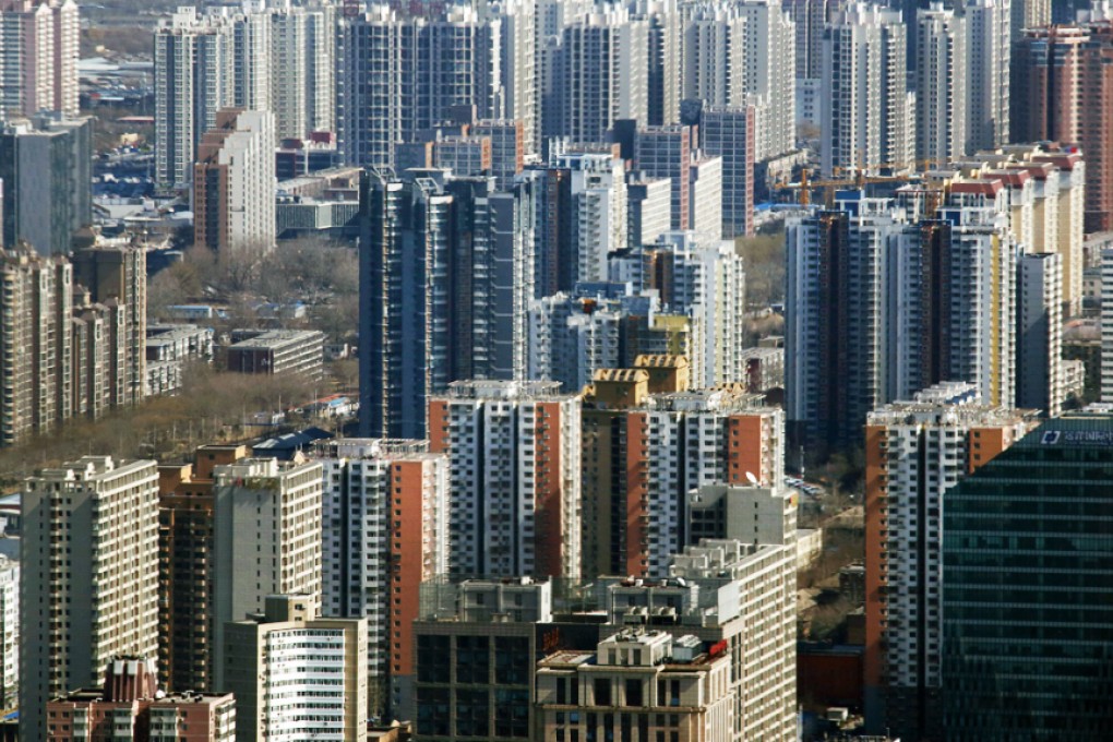 Residential apartment and commercial buildings are seen in Beijing as relaxation measures are seen boosting the property market. Photo: Bloomberg