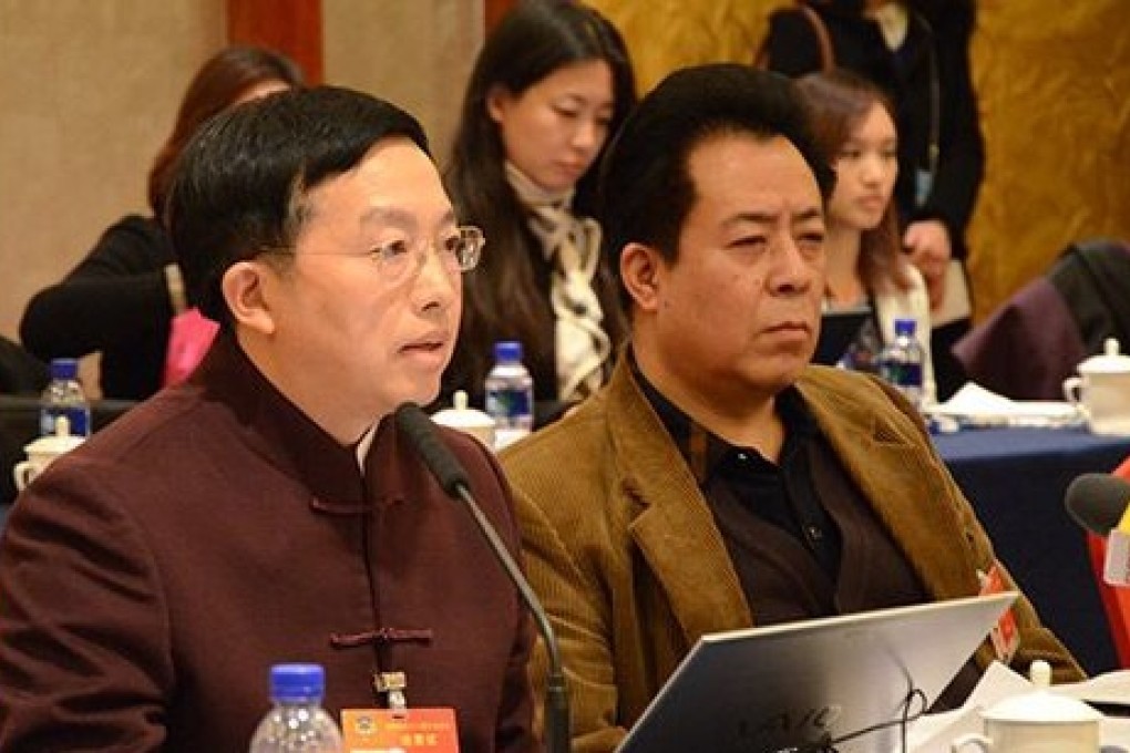 Lawyer Zhu Zhengfu, left, says defendants are routinely considered guilty when appearing before the country's courts. Photo: Iqilu.com