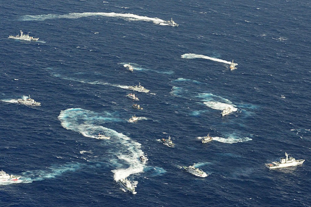 Fishing boats from Taiwan near the disputed islands are shadowed by ships from the Taiwanese and Japanese coastguards. Photo: Reuters