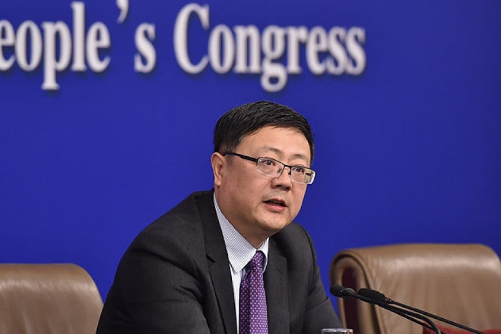 Minister of Environmental Protection Chen Jining speaks at the National People's Congress in Beijing on Saturday.