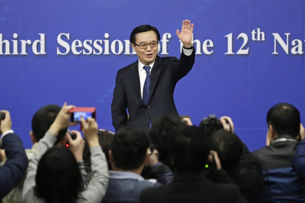 Commerce Minister Gao Hucheng faces the media in Beijing yesterday. He said the mainland will push for free trade deals. Photo: Reuters