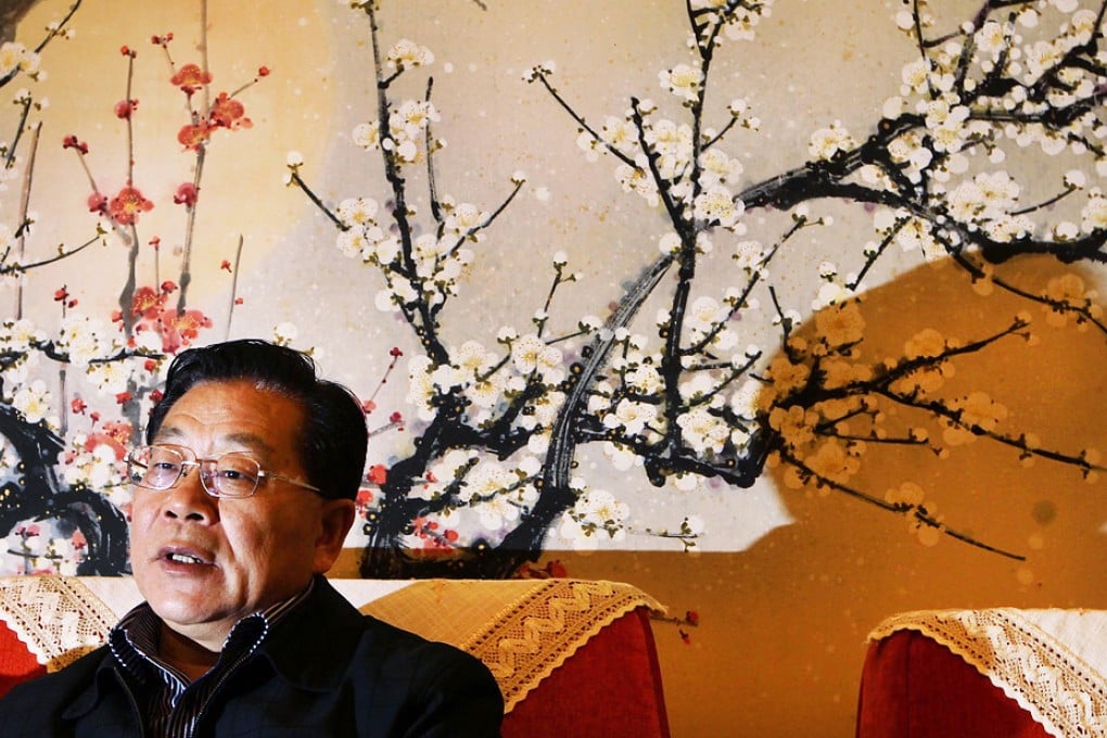 Li Chunhong speaks about the bridge cost overrun. Photo: Simon Song