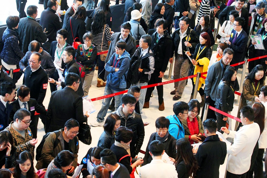 Potential buyers at the sales office of Cheung Kong's La Lumiere development. Photo: Dickson Lee