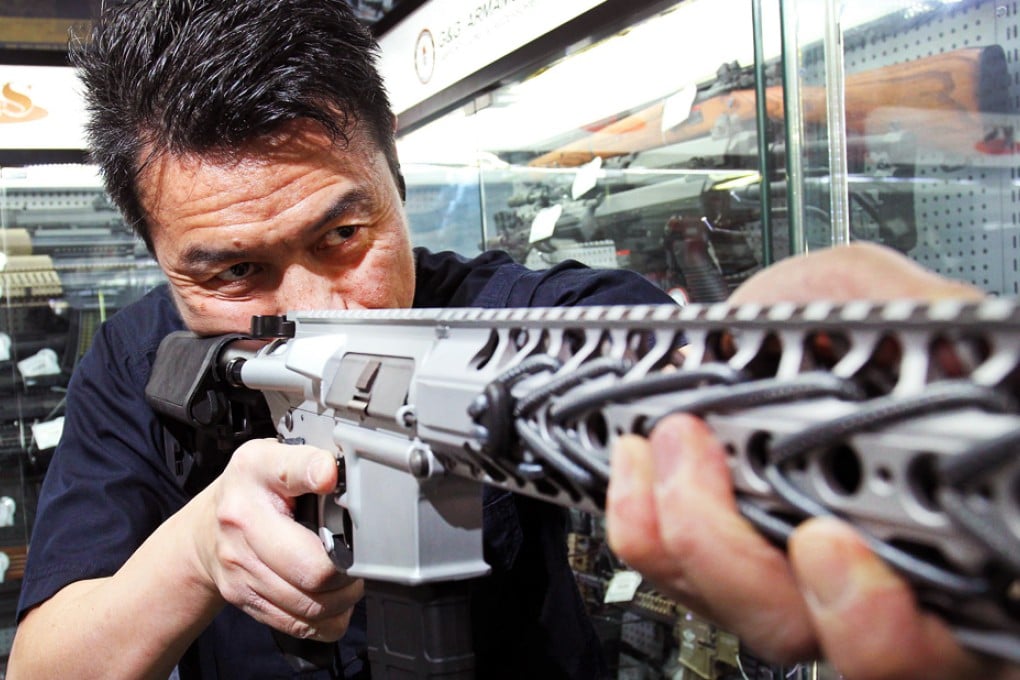 Stanley Leung of eHobby Asia takes aim. Photo: May Tse