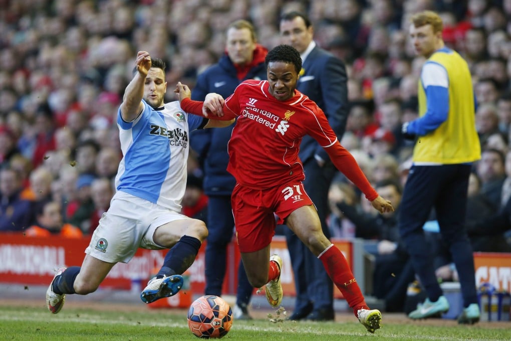 The managers look on as Raheem Sterling is put under pressure. Photo: Reuters