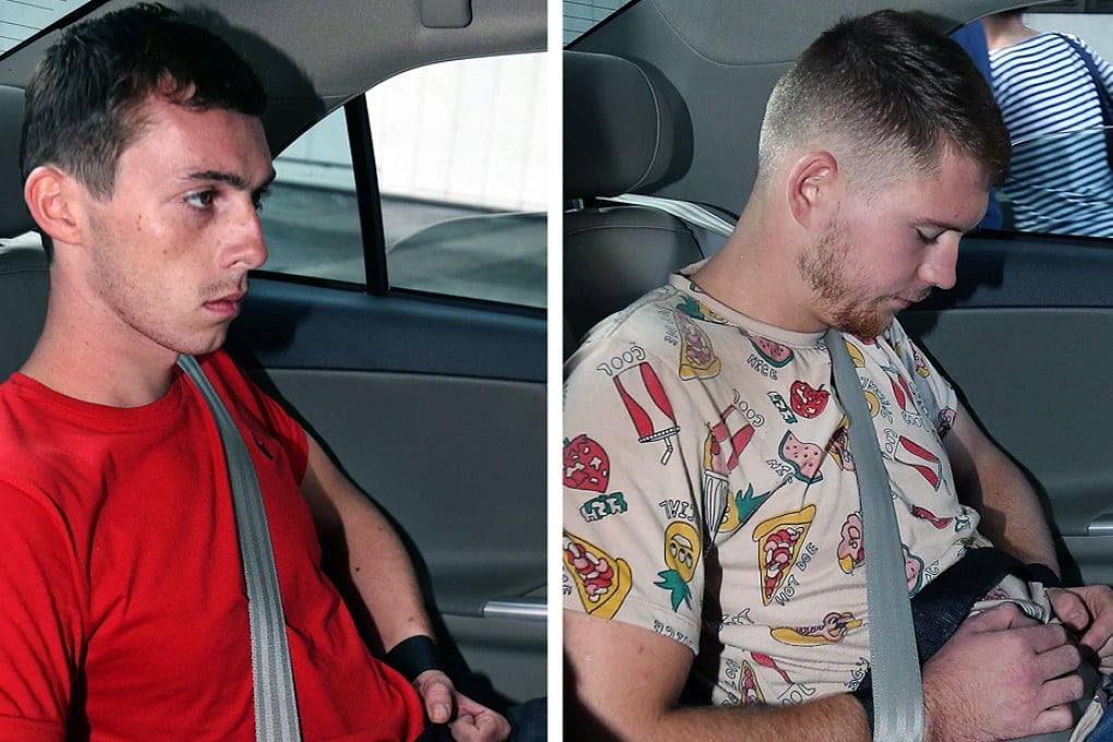 German citizens Andreas Von Knorre (left) and Elton Hinz, both charged for vandalising an SMRT train at Bishan Depot, arriving at the State Court in Singapore on November 22, 2014. Photo: Reuters